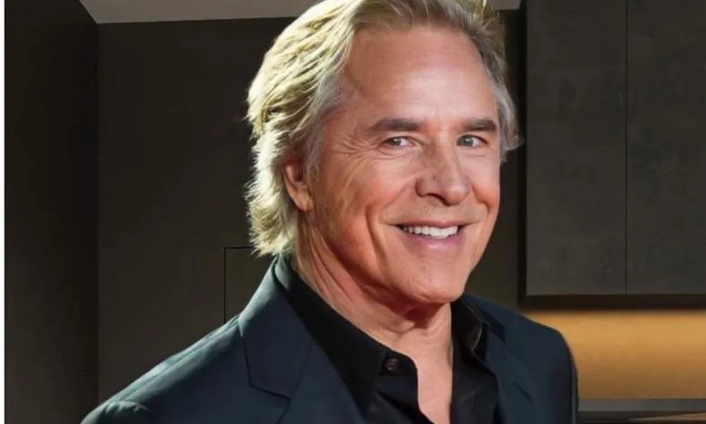 Smiling older man with blond hair in a dark suit-don johnson net worth