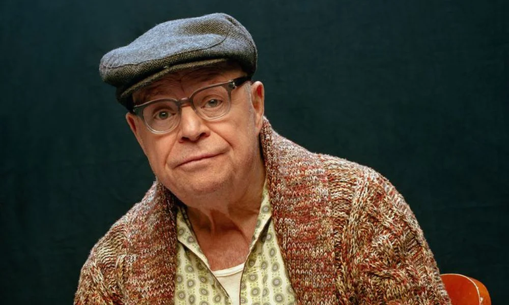 An older person wearing glasses