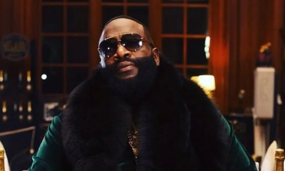 A man with a full beard and sunglasses