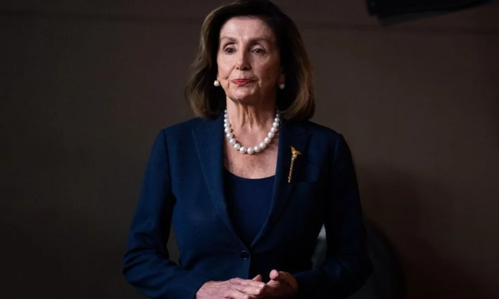 A person in a dark blue suit-Nancy Pelosi Net Worth