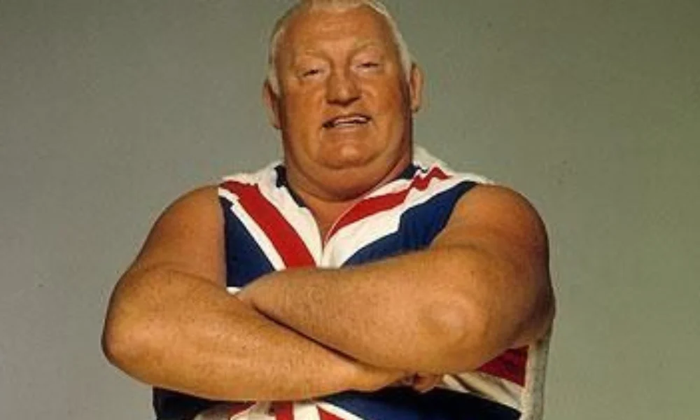 person with a muscular build and short hair-Big Daddy Biography