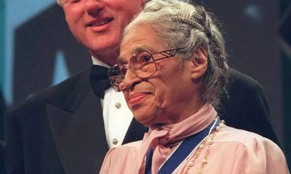 An elderly woman with glasses