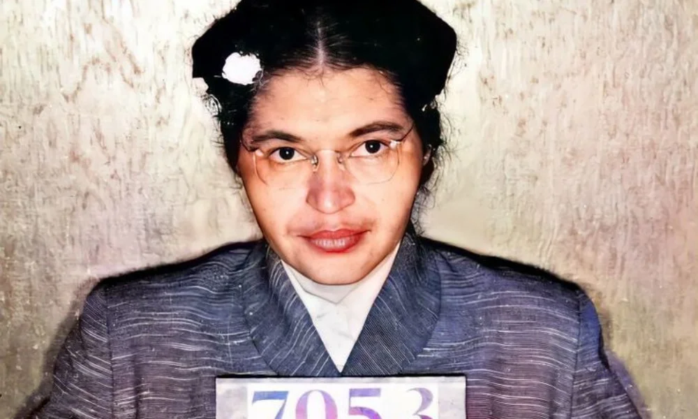 A woman in a vintage gray suit