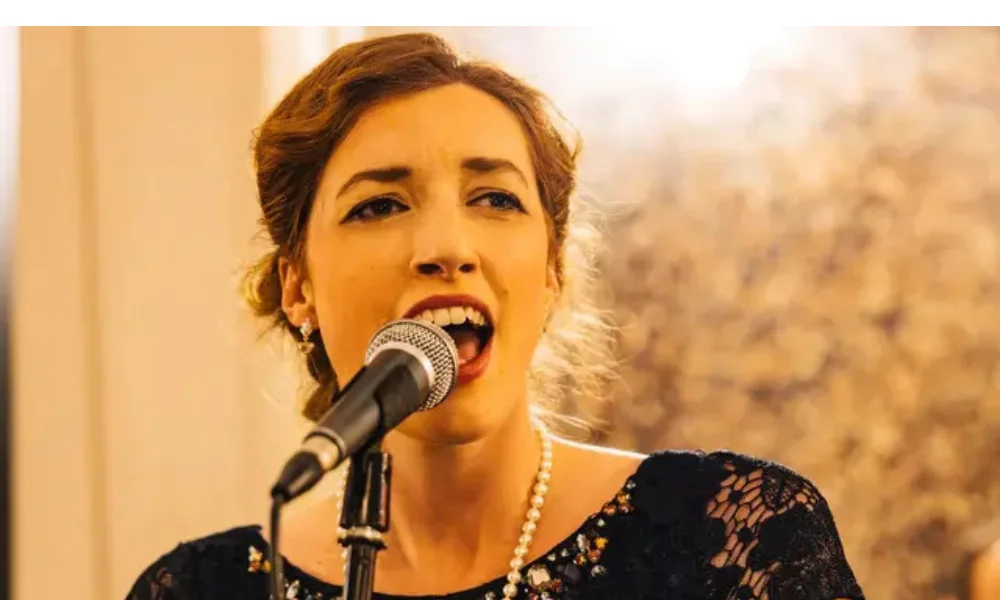 woman passionately sings