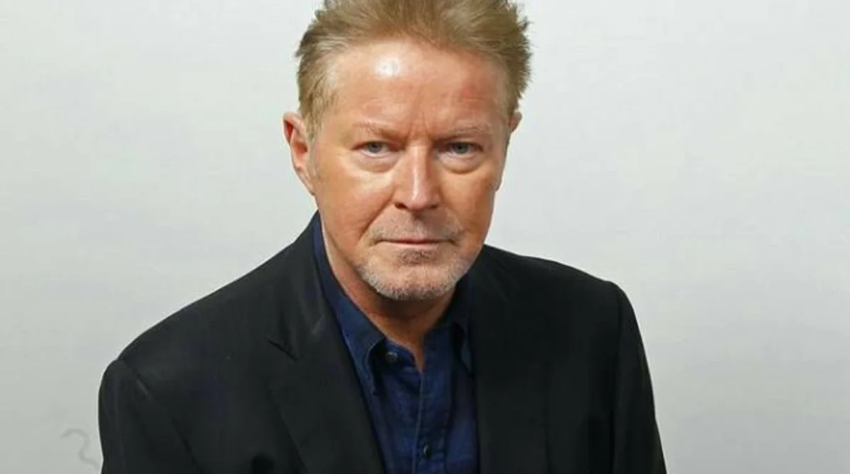 A person with short, light brown hair